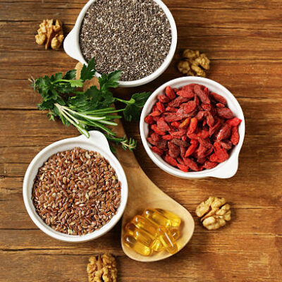 Super food goji berries, chia seeds, flax seeds, walnuts and omega 3 capsules